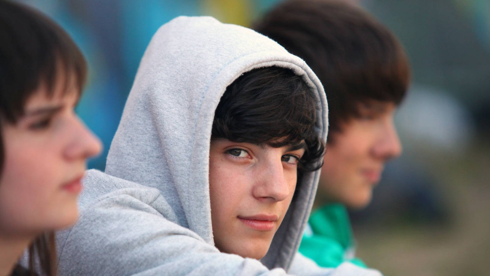 Three teenagers sat together